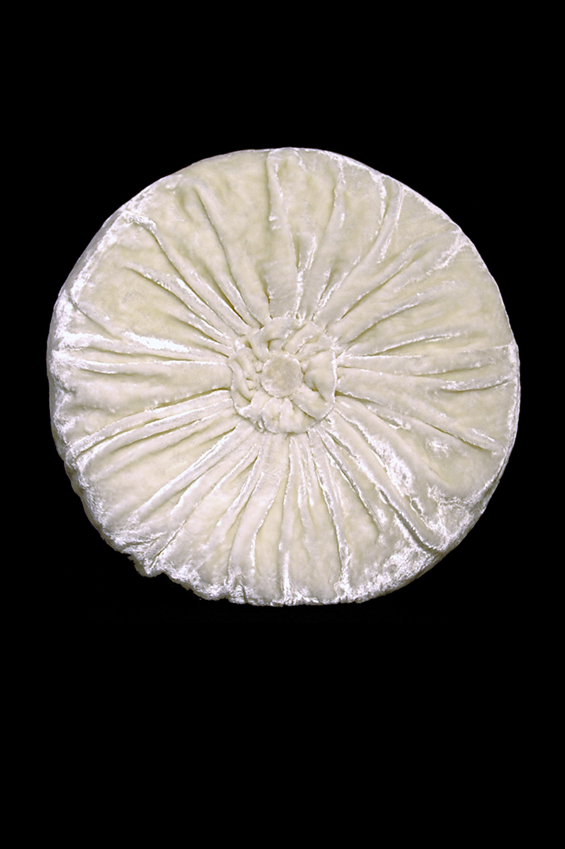 Delphos furrowed velvet rounded white cushion